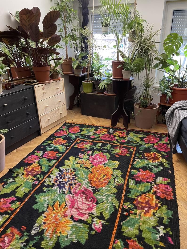 Floral handwoven carpet, colors on a black background - 262x160cm