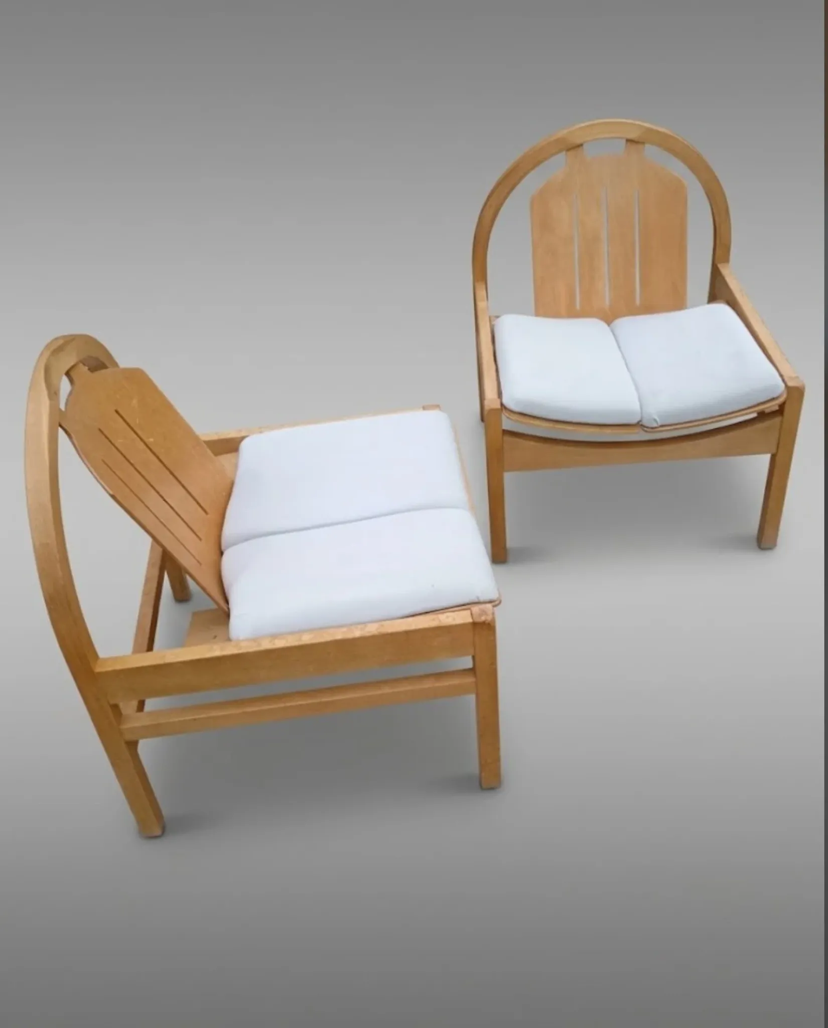 Pair of Argos lounge chairs by Baumann