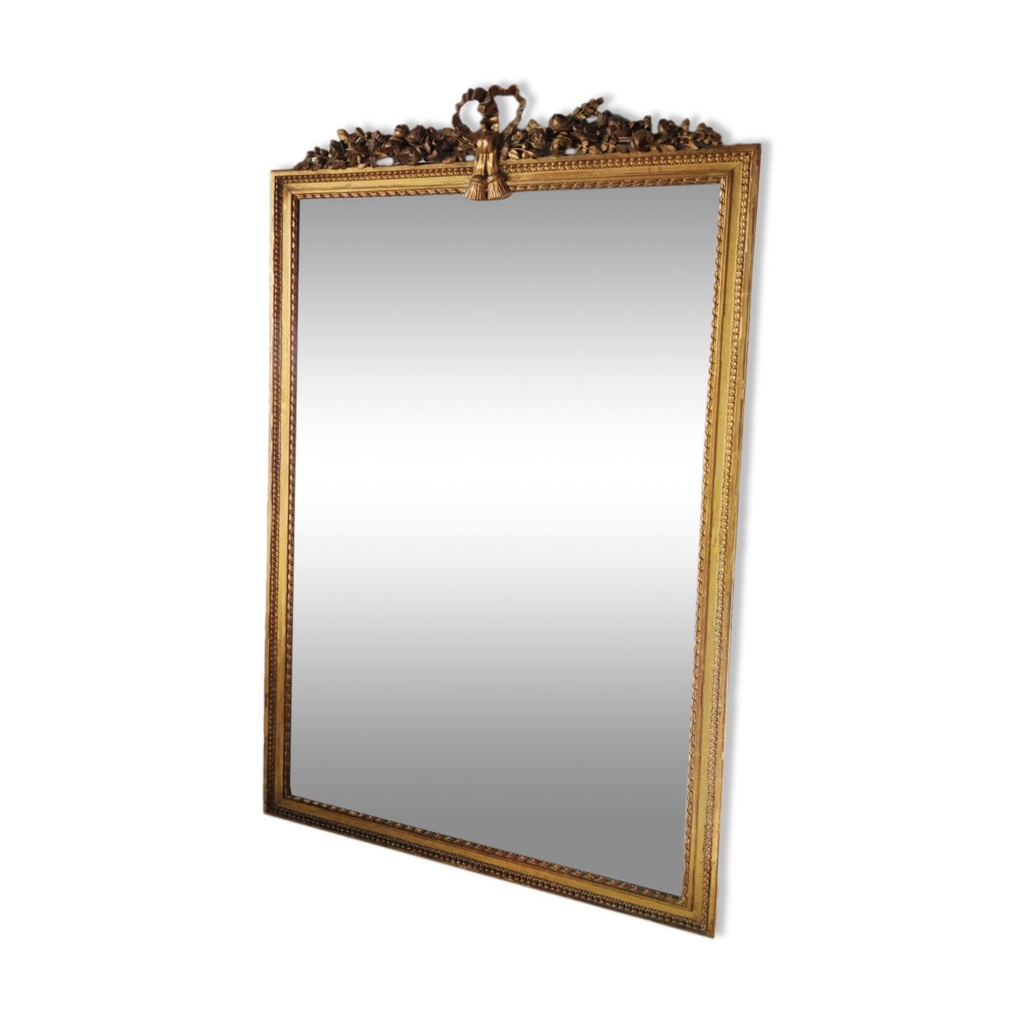 Miroir de cheminée en bois doré à décor de nœud et de roses H : 164 cm