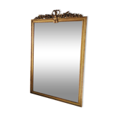 Fireplace mirror in gilded wood decorated with knot and roses H: 164 cm