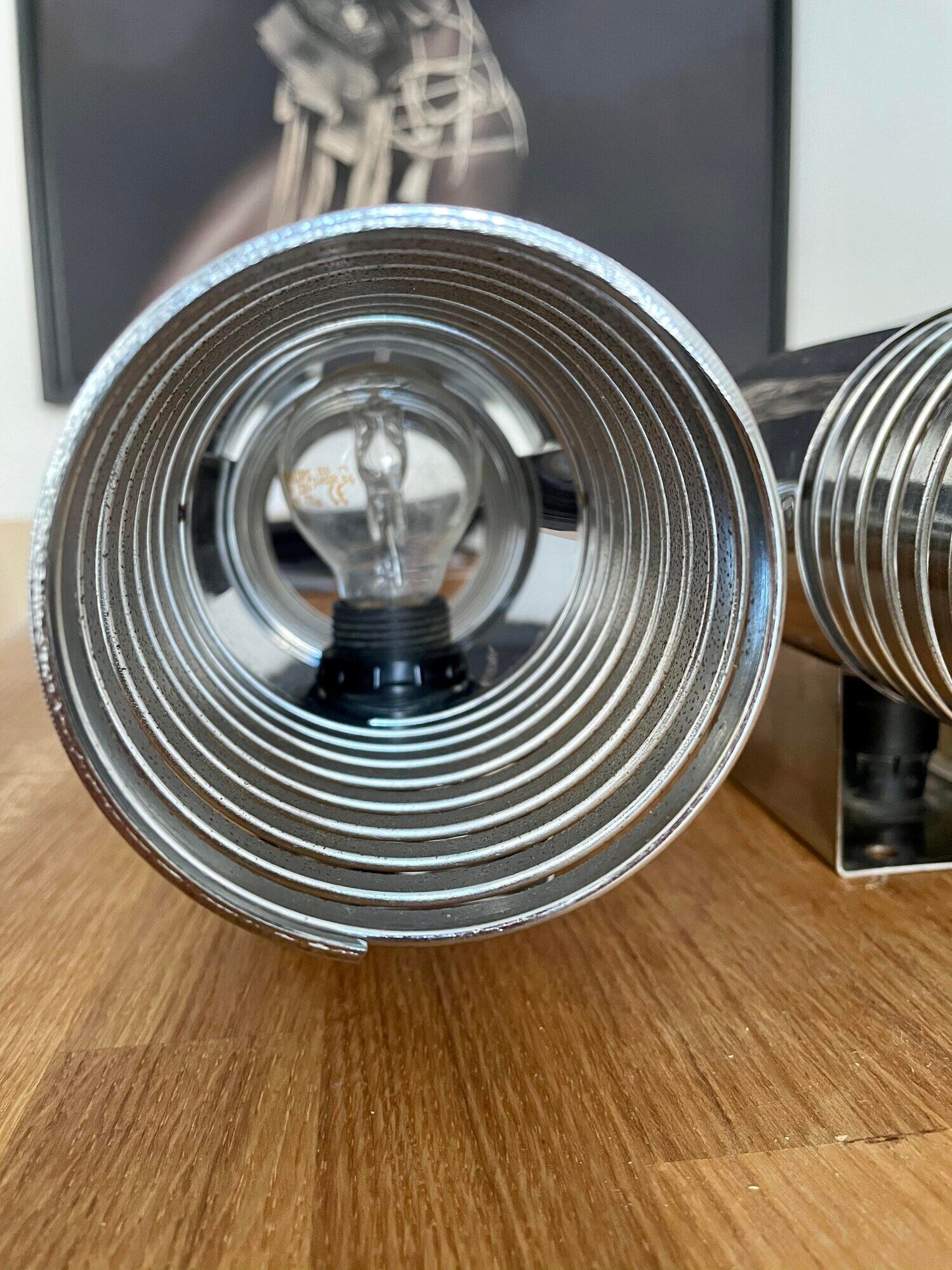 Pair of vintage wall lamps "Spring", chromed metal, France 1970