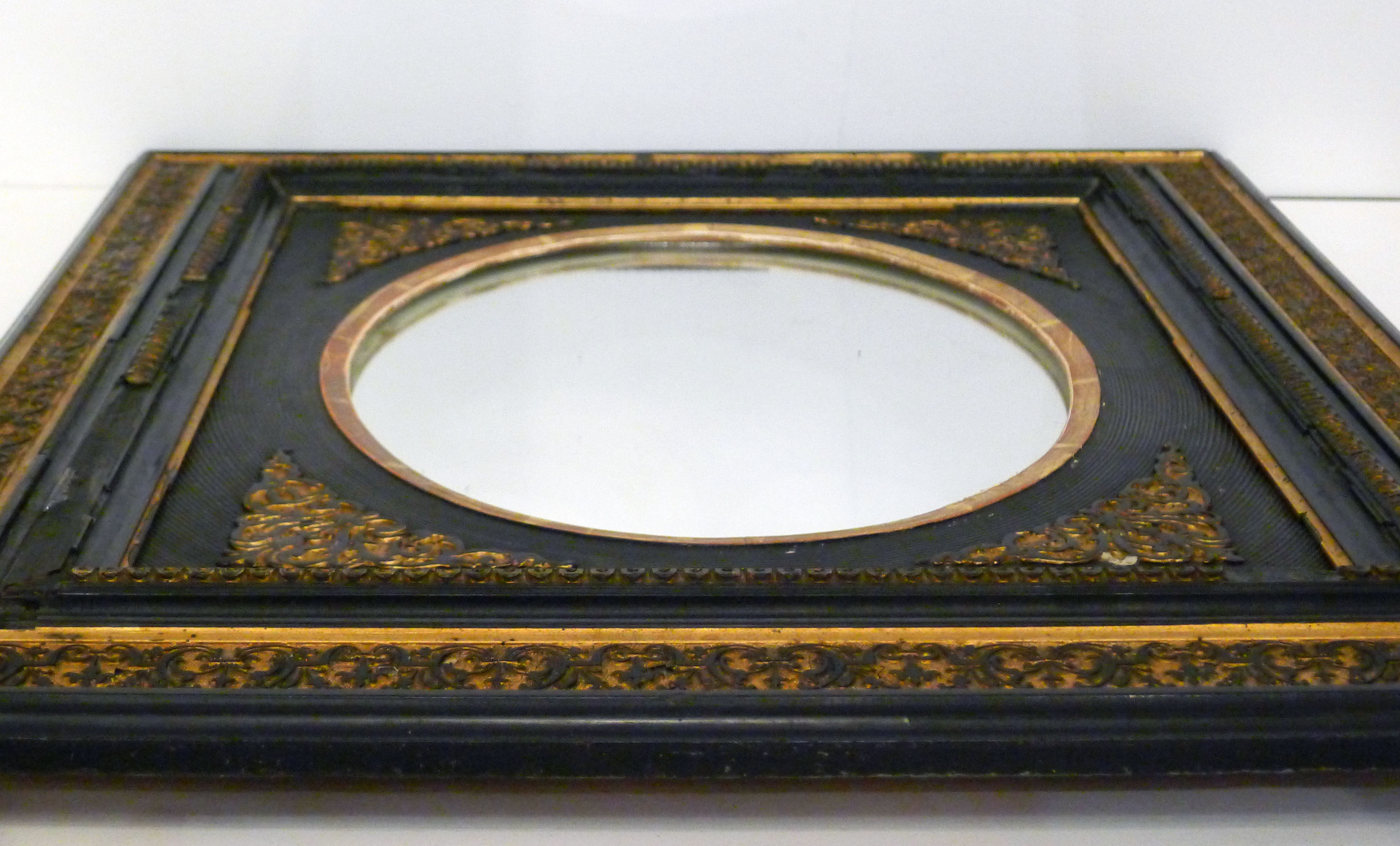 Napoleon III black oval mirror - 69x59cm