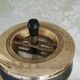 Vintage push-button ashtray from the 70s – Black and brass – With shelf