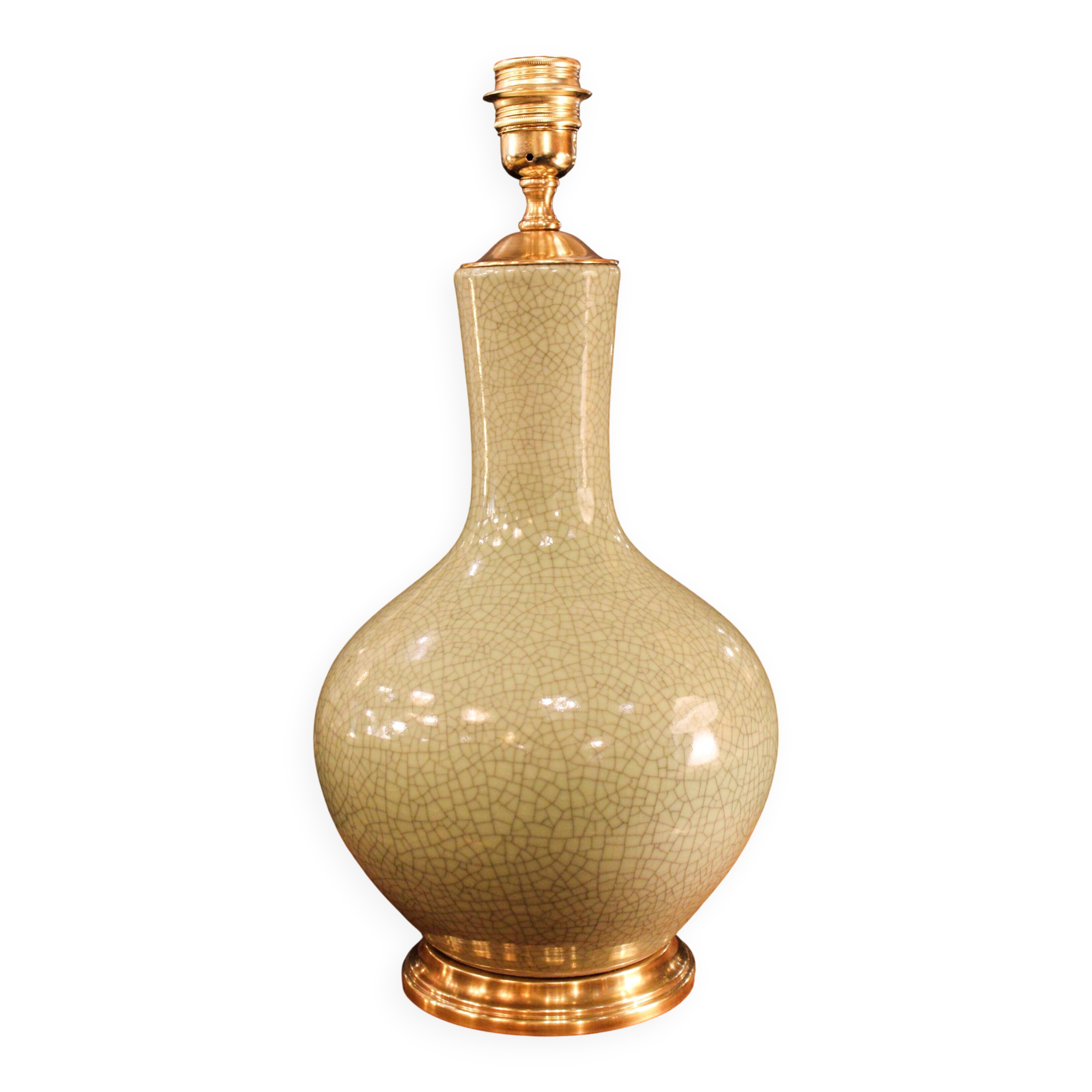 Ceramic lamp with a crackled celadon green finish.