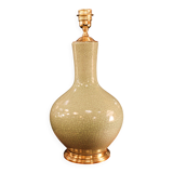 Ceramic lamp with a crackled celadon green finish.