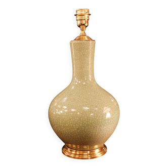 Ceramic lamp with a crackled celadon green finish.
