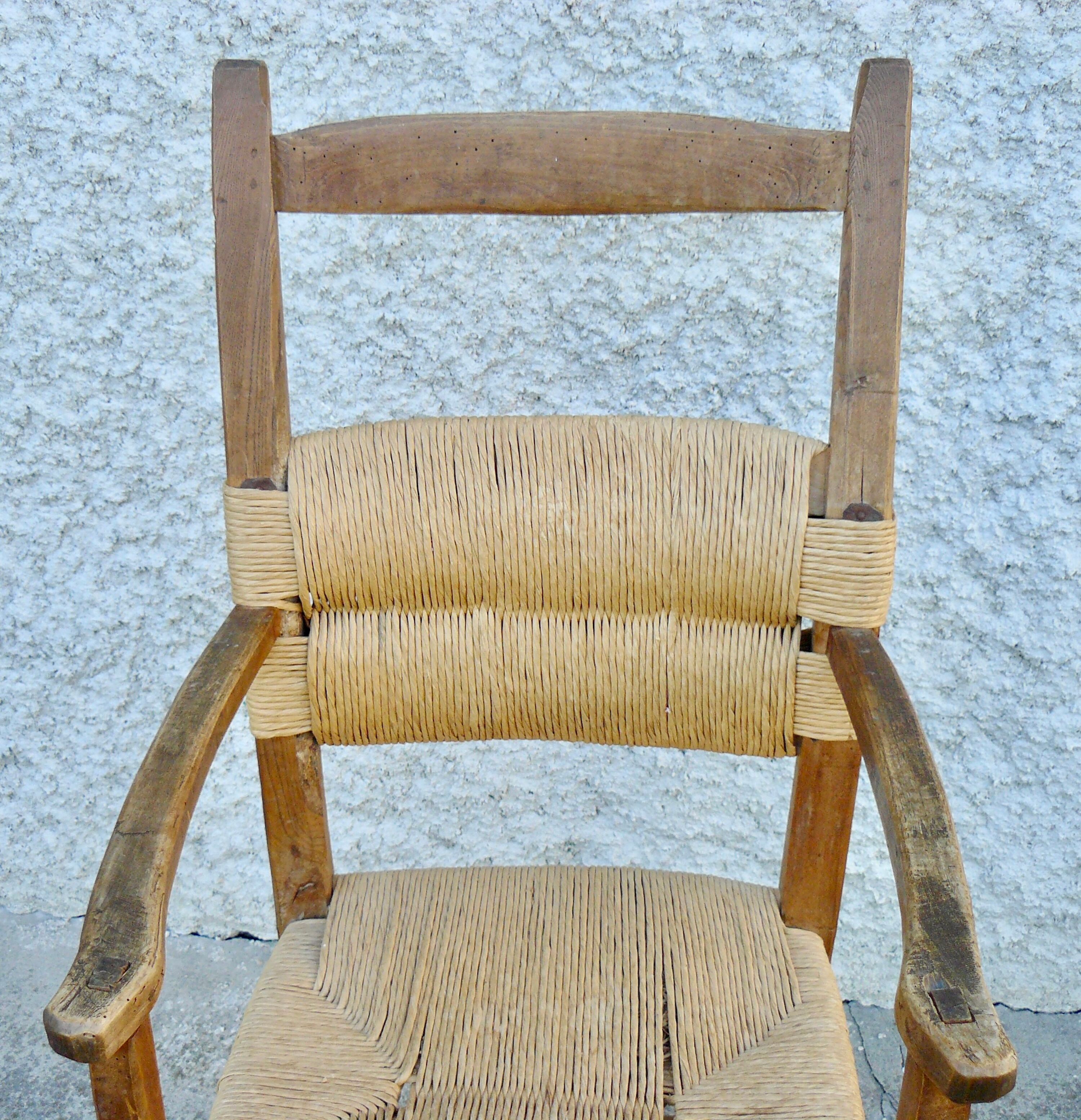Brutalist straw armchair Folk art