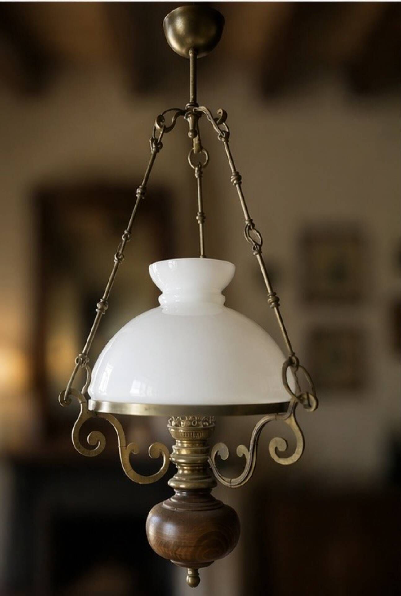 Antique Napoleon III suspension in brass, wood, and opaline glass.