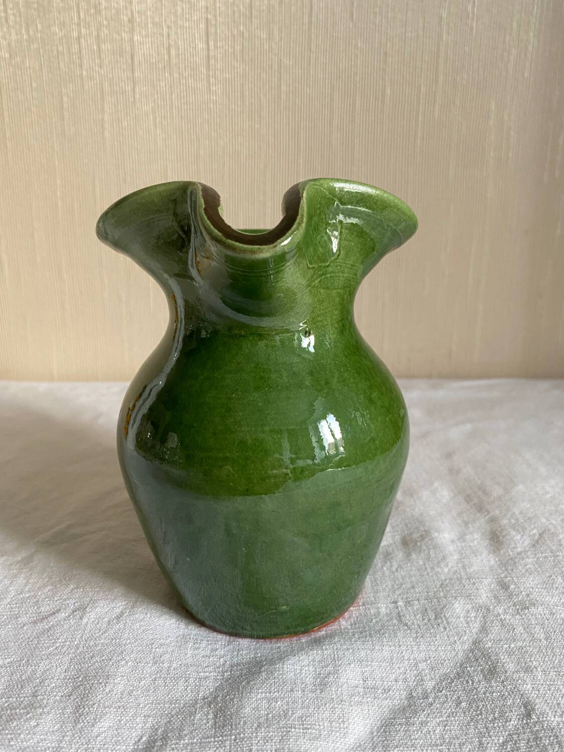 Provençal pitcher in green glazed earthenware