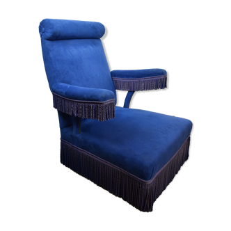 Blue velvet armchair