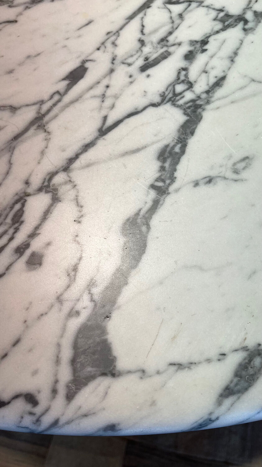 Marble and wicker dining table