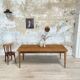 Vintage farm table with spindle legs.