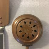 batch of copper utensils