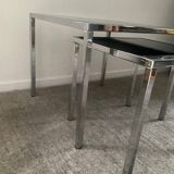 Pair of nesting tables in chromed metal and glass