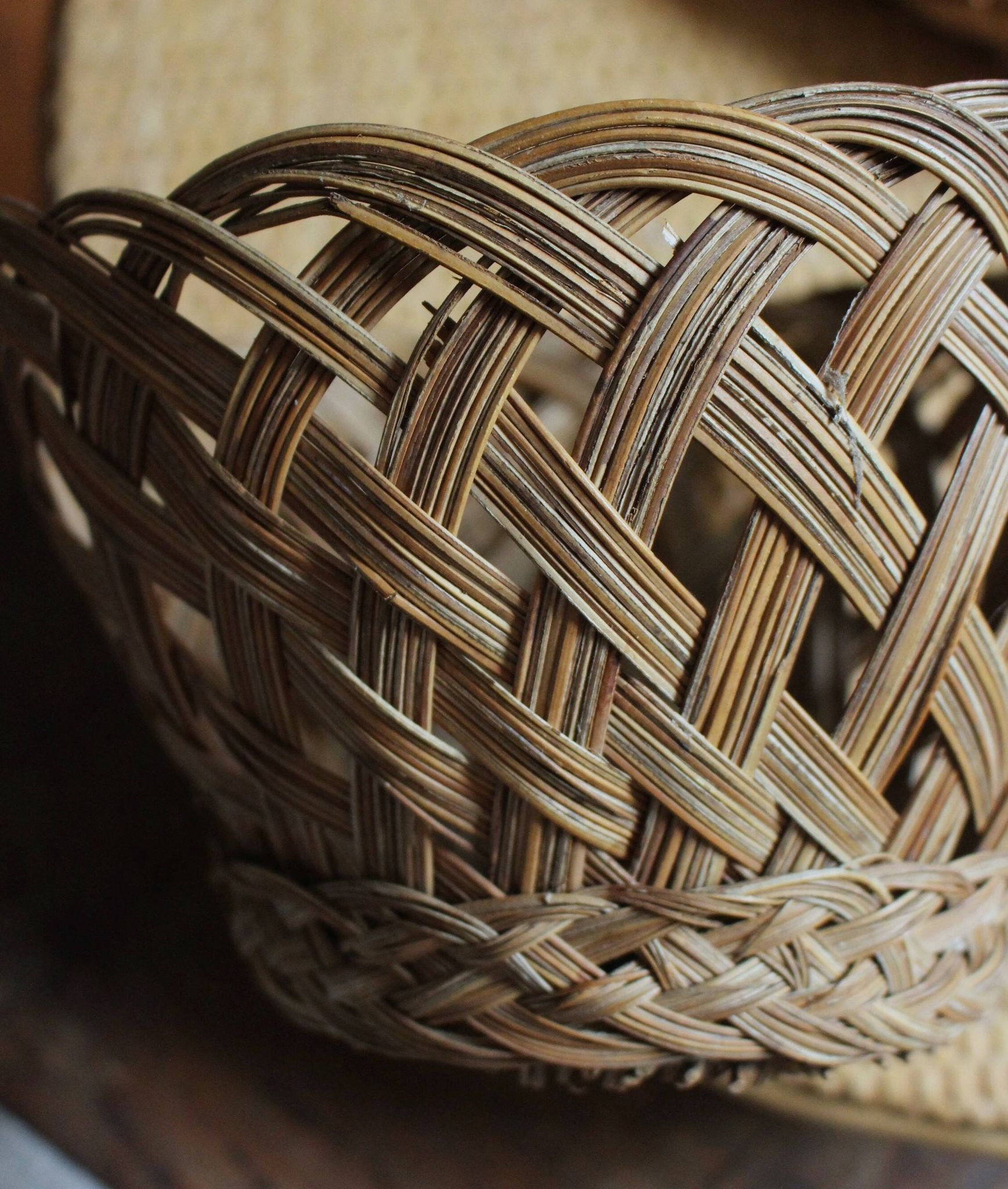 Vintage high round wicker basket with openwork.