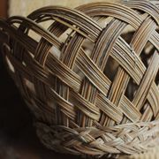 Vintage high round wicker basket with openwork.