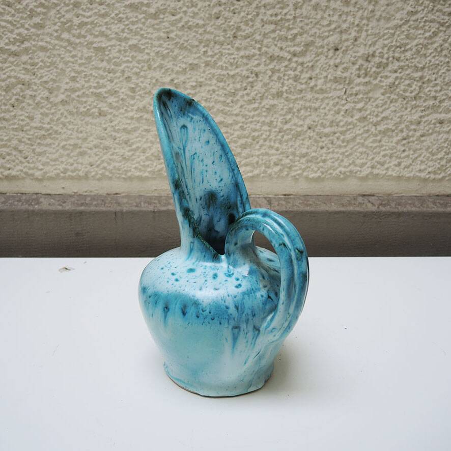 Old 'long spout' turquoise ceramic jug