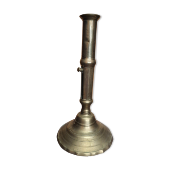 Golden candle holder with old pusher