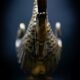 Bronze patinated pocket emptier with swan decoration by Max Le Verrier.