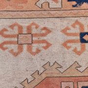 Tapis persan bleu marine et crème