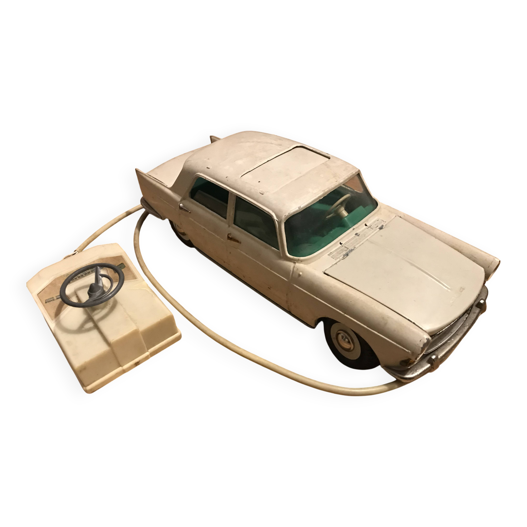 Peugeot 404 remote-controlled car from the 60s. France Jouets brand.
