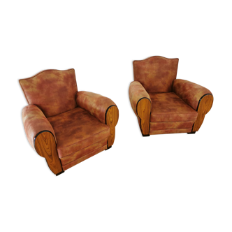 Pair of restored club armchairs, 50s