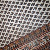 Tapis vintage fait main Seraband en laine blanche et brune (124cm x 185cm)