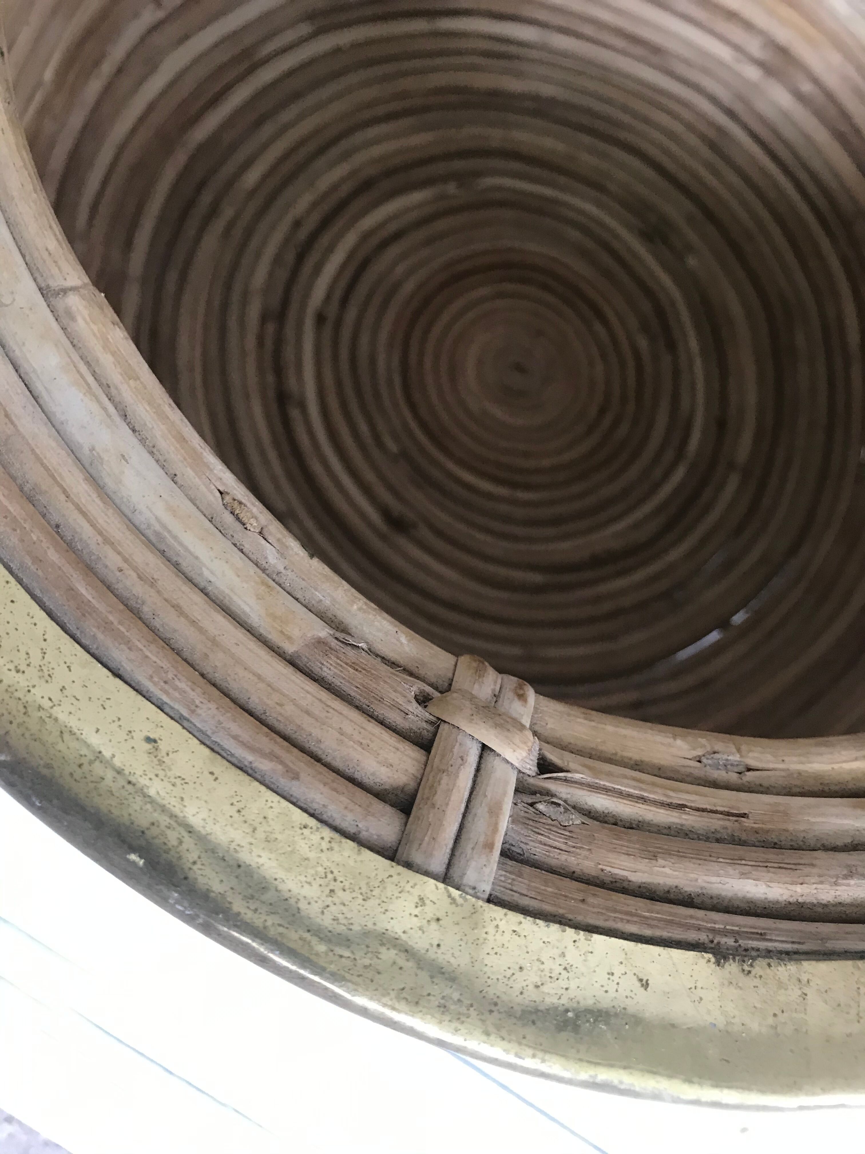 Rattan and vintage brass pot cover