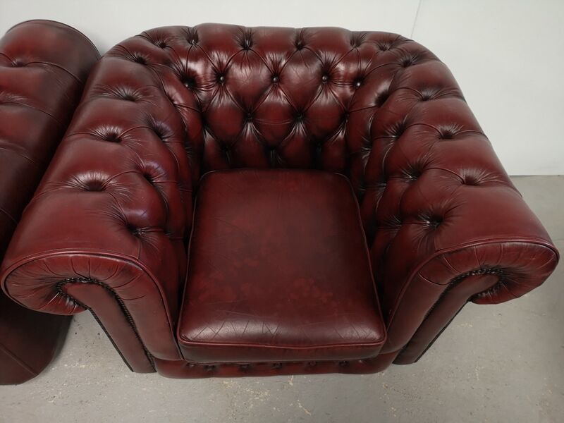 Burgundy leather chesterfield chairs