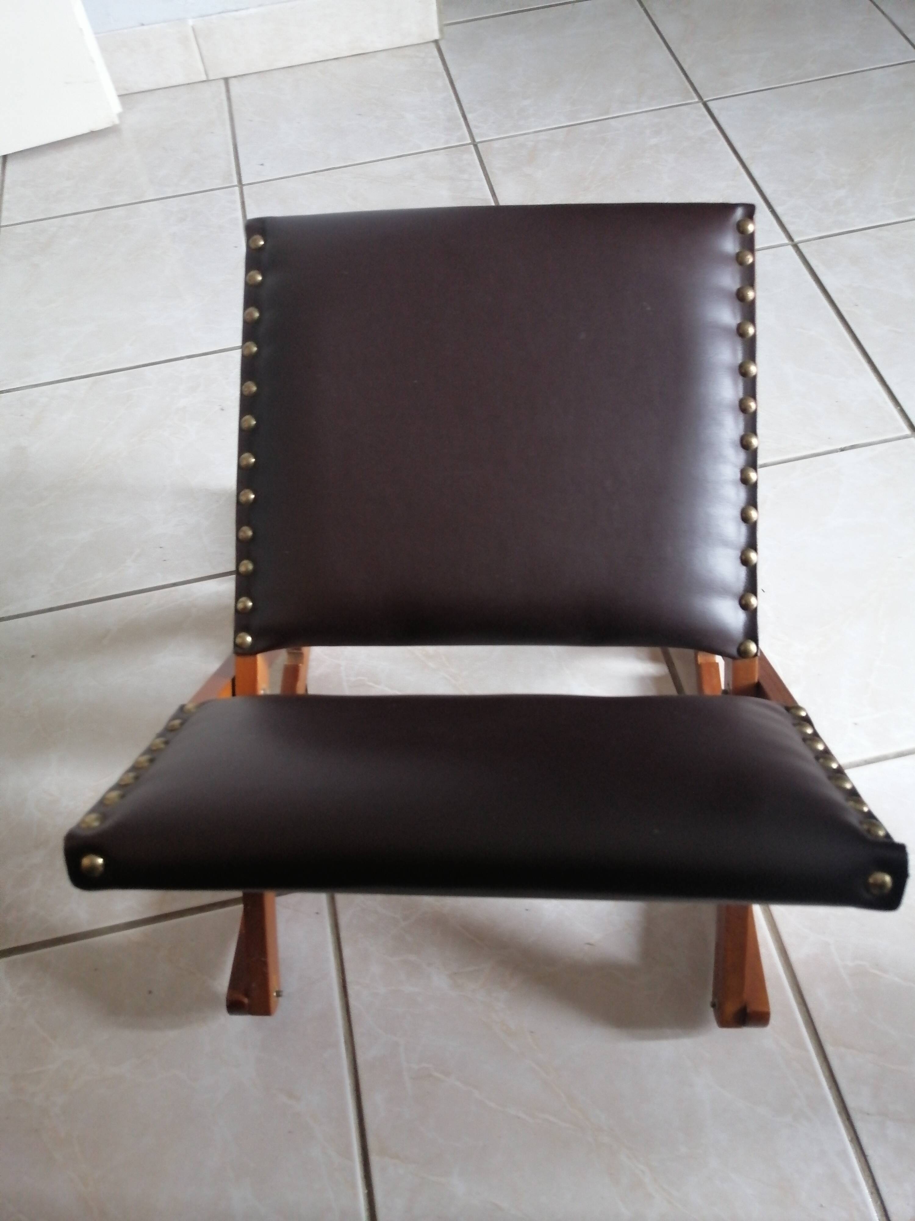 Vintage rocking footrests in wood and faux leather