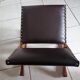 Vintage rocking footrests in wood and faux leather