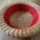Rattan basket with red trim
