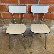 Pair of antique chrome metal chairs + white formica seat & back