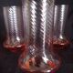 Art Deco orangeade service in pink-orange glass, twisted model.