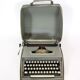 Remington travel-deter Deluxe typewriter with  case
