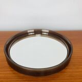 Round mirror with amber rim from the 70s, vintage