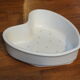 Old white porcelain heart mold (faisselle or Neufchatel)
