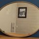 Oval mirror metal patinated pearl art deco