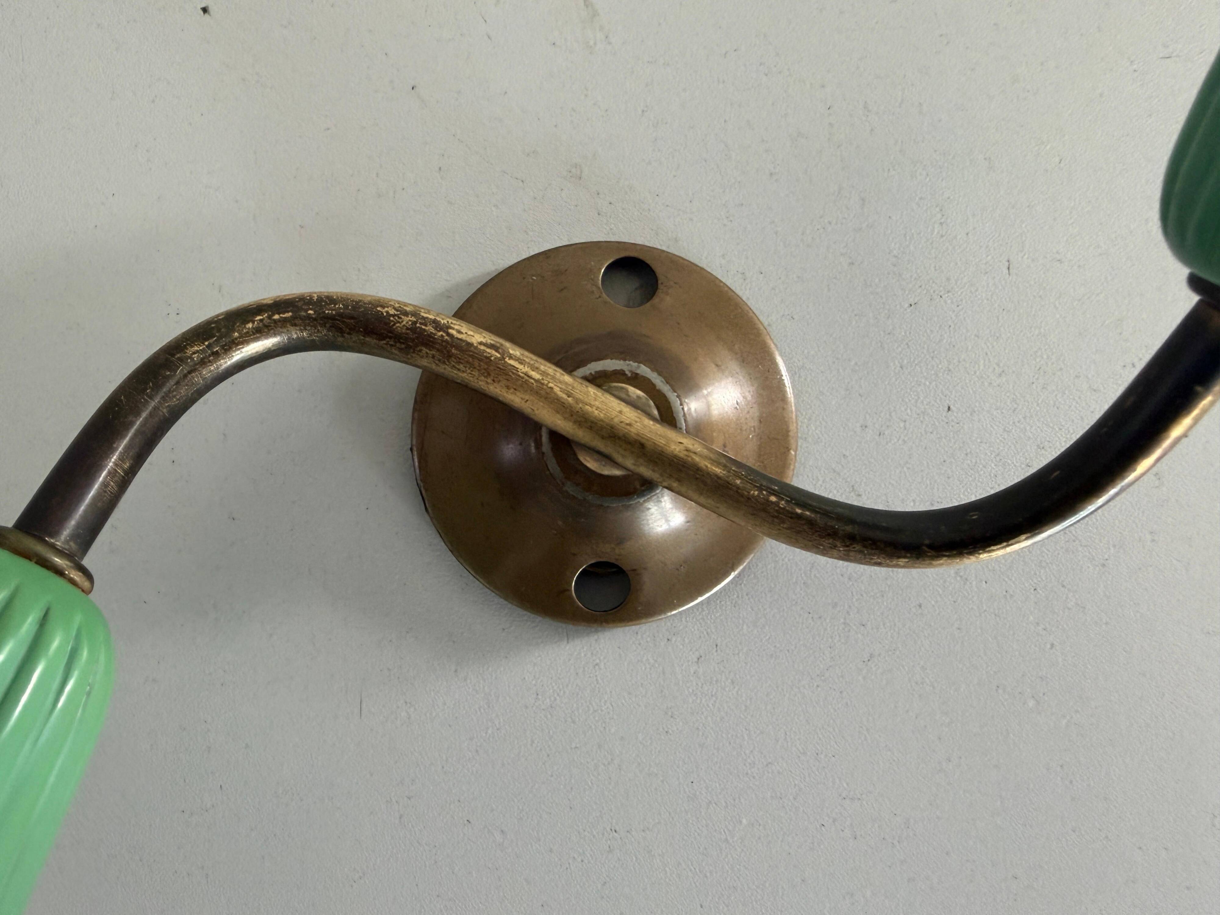 Small simple 2-headed brass wall light, 1950s, Italy.