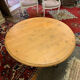 Round wood and wrought iron coffee table