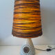 Accolay Lamp, the base in glazed ceramic with openwork decoration.