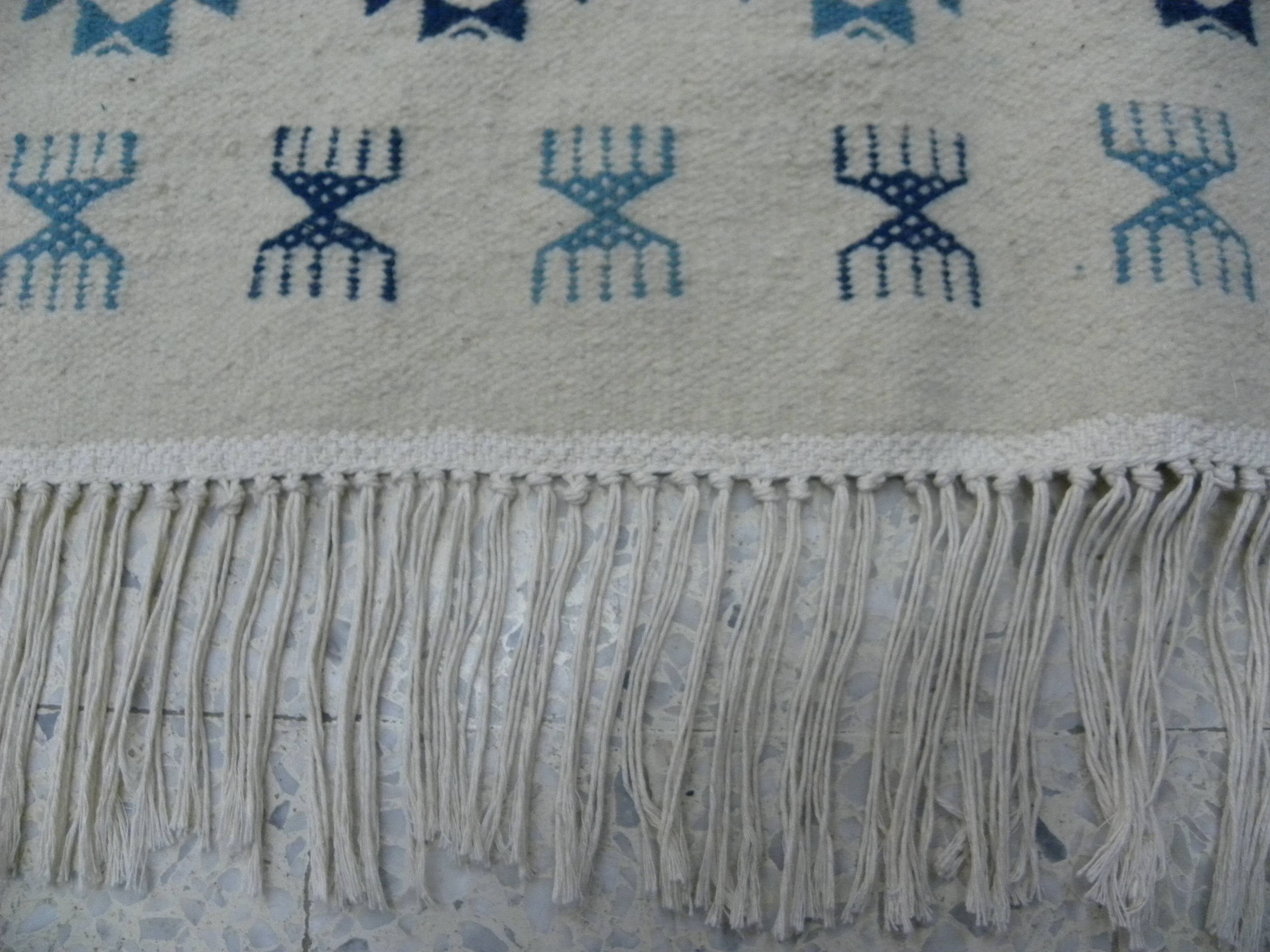 Nomadic Tunisian Berber rug, margoum kilim, ethnic in beige and blue wool.