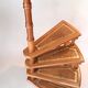 Library spiral staircase in beech and brown leather.