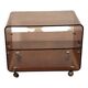 Smoked Plexiglas coffee table on wheels -