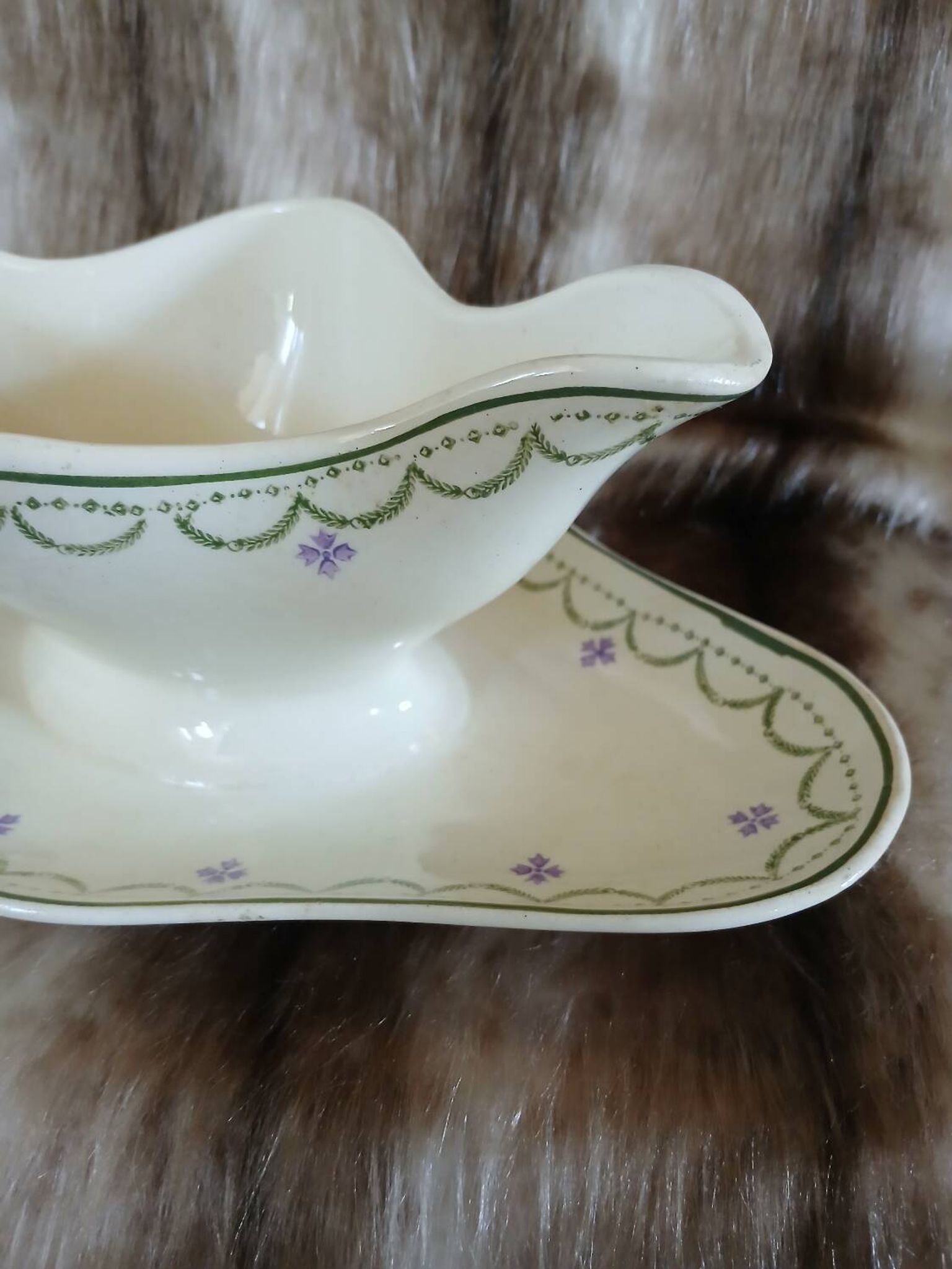Antique sauce boat in Longwy ironstone.