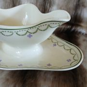 Antique sauce boat in Longwy ironstone.