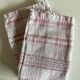 Pair of 1950 red woven kit towels