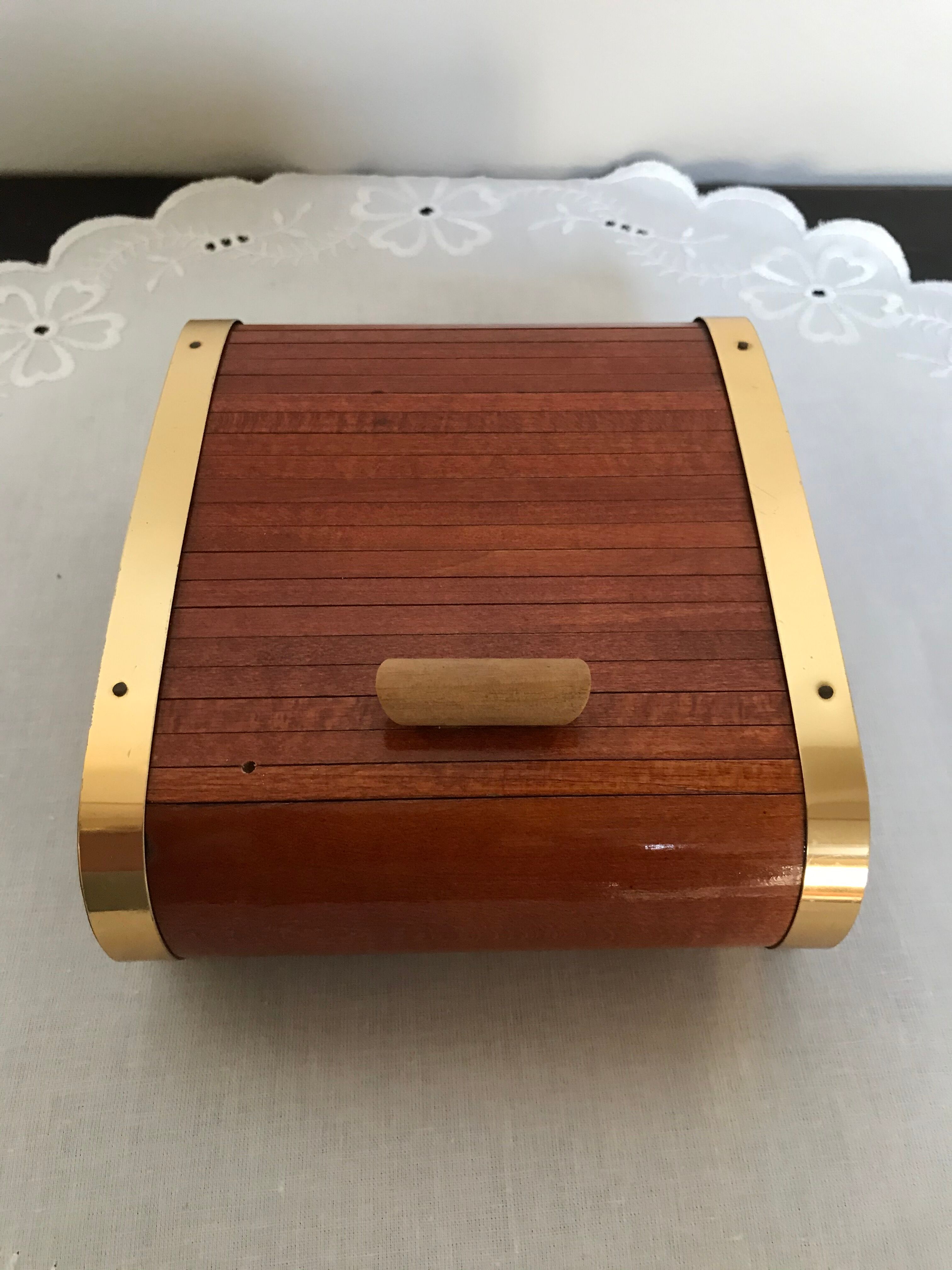 Vintage wooden cigarette box and brass curtain sliding lid
