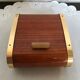Vintage wooden cigarette box and brass curtain sliding lid