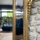 Antique mirror with a frame 123/100cm with gilded pediments, eagle heads, antique.